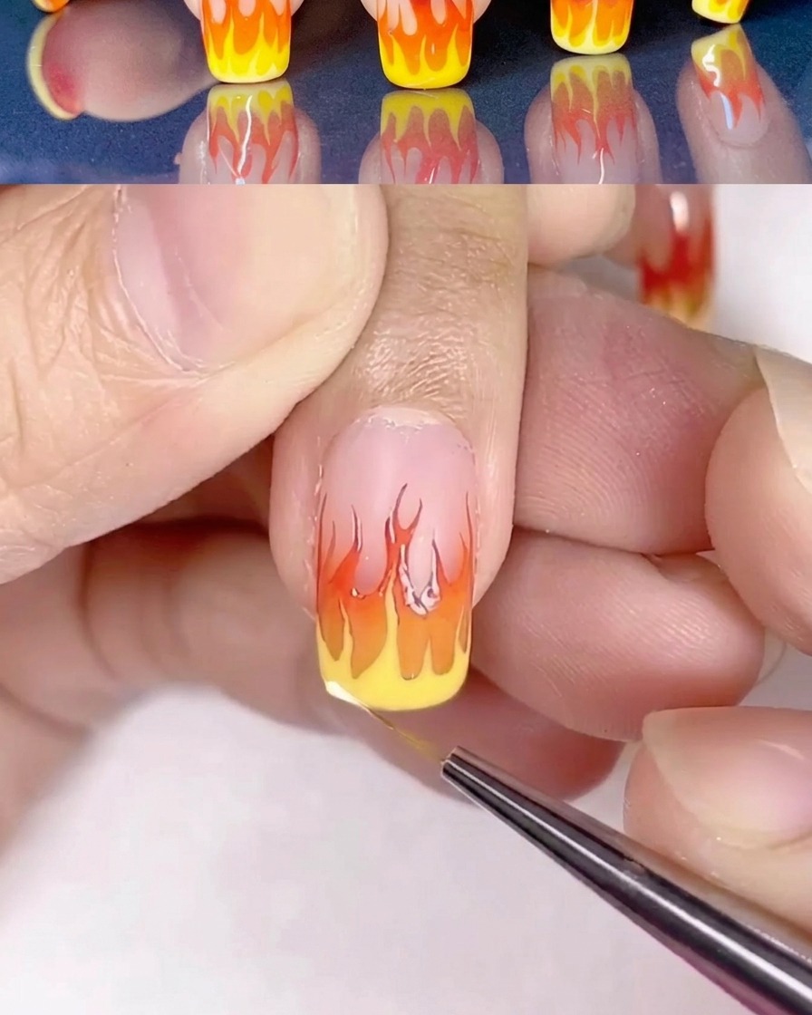 Nail art flammes détaillé avec ajout de points de lumière en jaune clair.