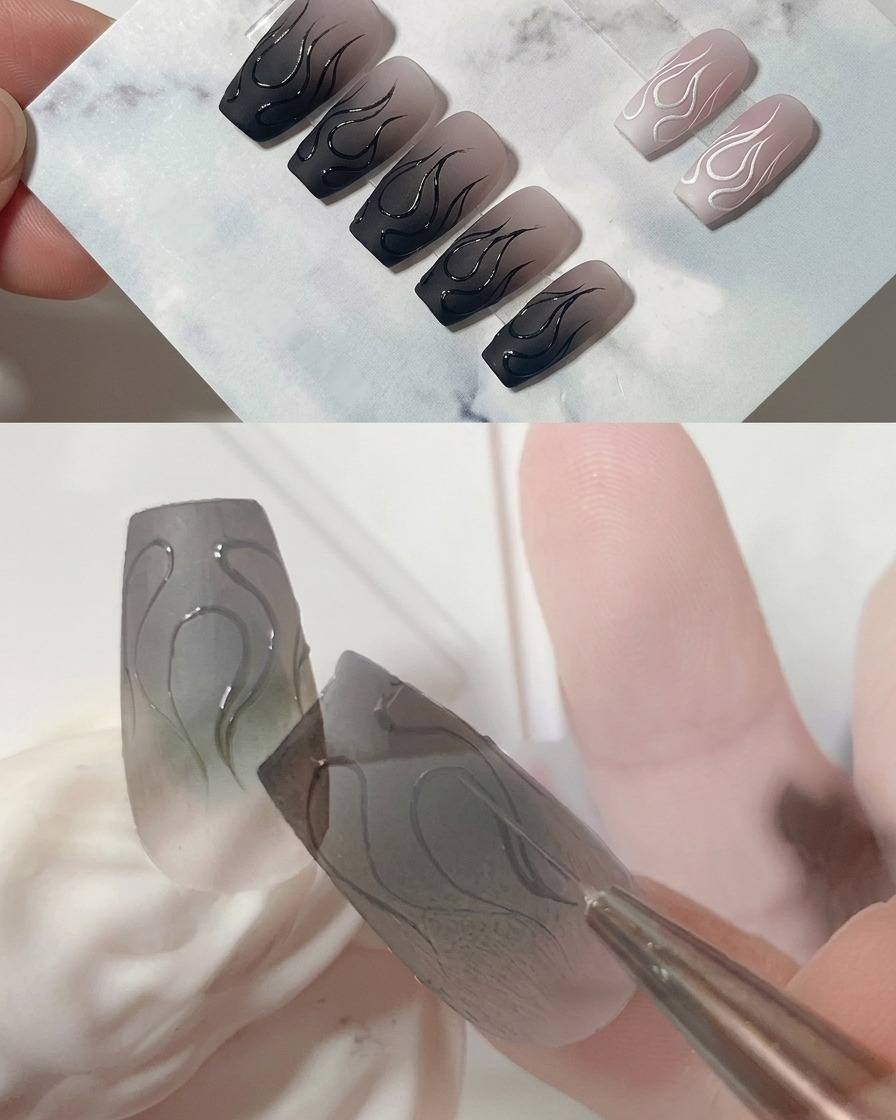 Plan macro dun pinceau liner peaufinant la pointe effilée de la flamme centrale sur un ongle gris mat.