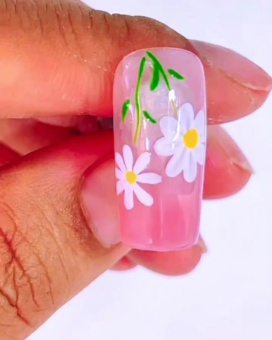 Une capsule dongle avec une base dégradée rose appliquée en douceur.