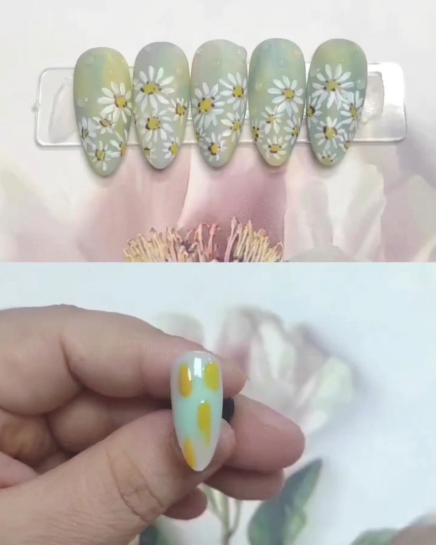 Un petit pinceau déposant des points de gel jaune sur un fond dégradé pour marquer lemplacement des fleurs.