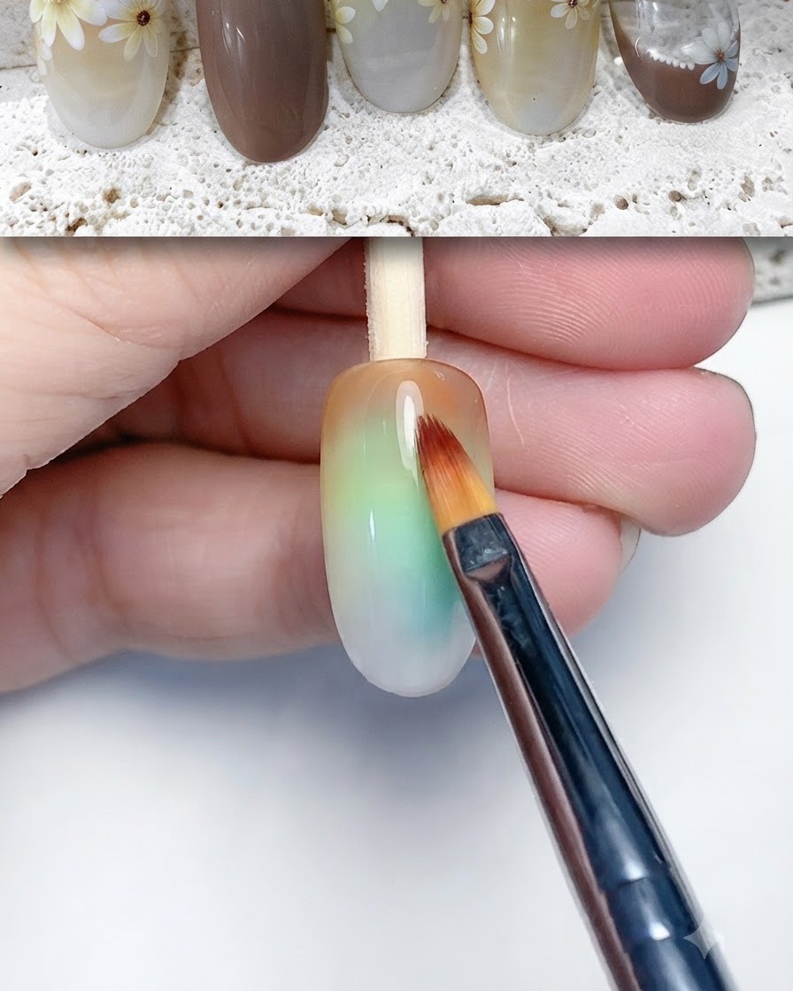 Un pinceau appliquant du liquide ou du gel blooming sur toute la surface de longle.