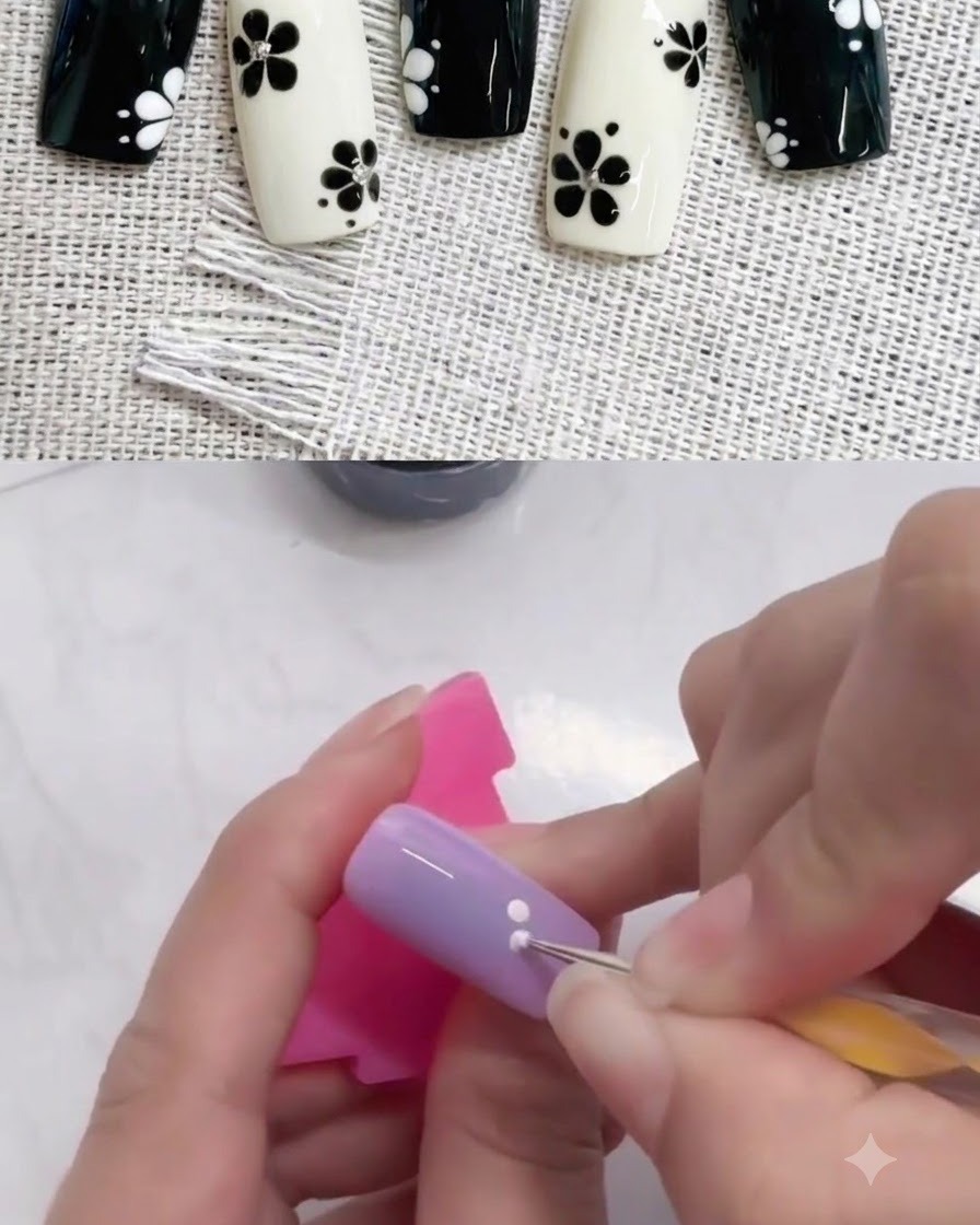 Un dotting tool ajoutant un deuxième punto blanc à côté du premier sur un ongle violet.