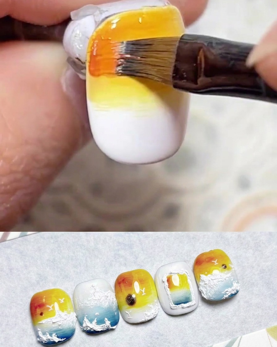 Un pinceau appliquant du gel orange vibrant sur le bord supérieur extrême de longle.