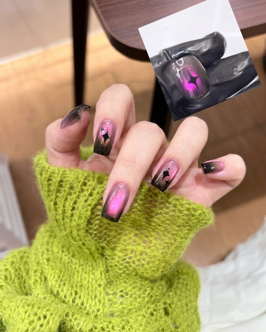 Un pinceau appliquant une couche de gel noir translucide sur un ongle naturel.