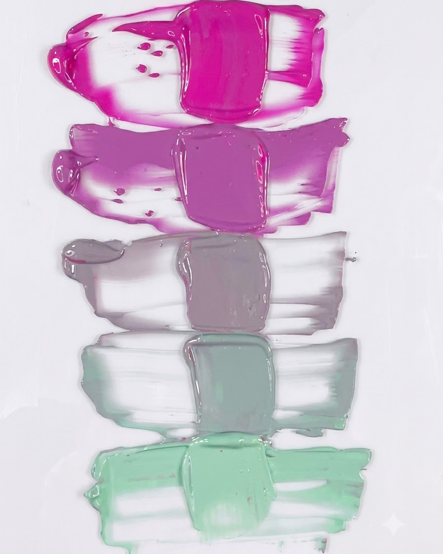 Un echantillon de degrade de couleurs vertical complet passant du rose neon pur au jade poudre et au vert sage.
