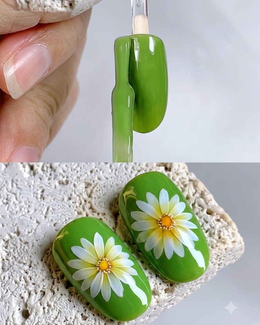 Un pinceau à ongles appliquant un vernis gel vert vibrant sur la surface dun nuancier dongles de forme ovale.