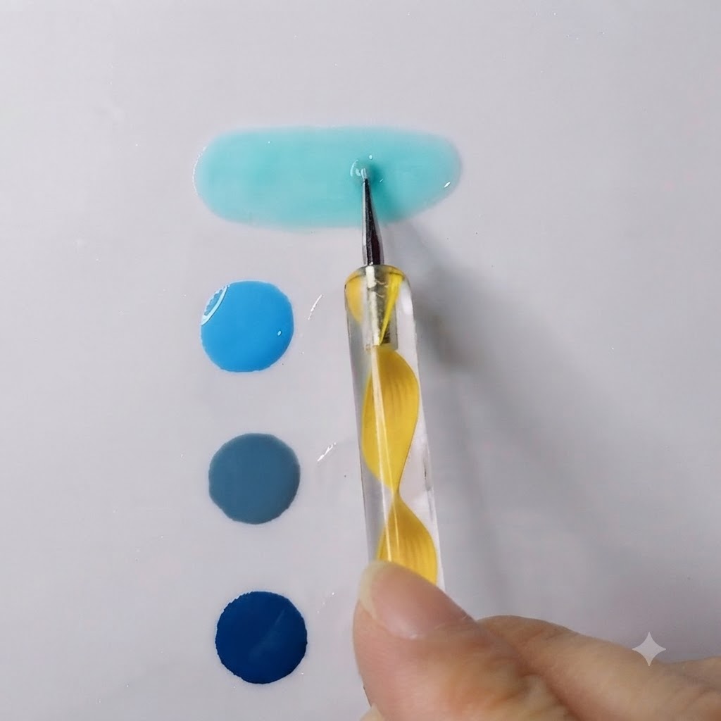 Un stylo à pointer mélangeant un gel bleu ciel vibrant avec du gel transparent en une flaque ovale et lisse.